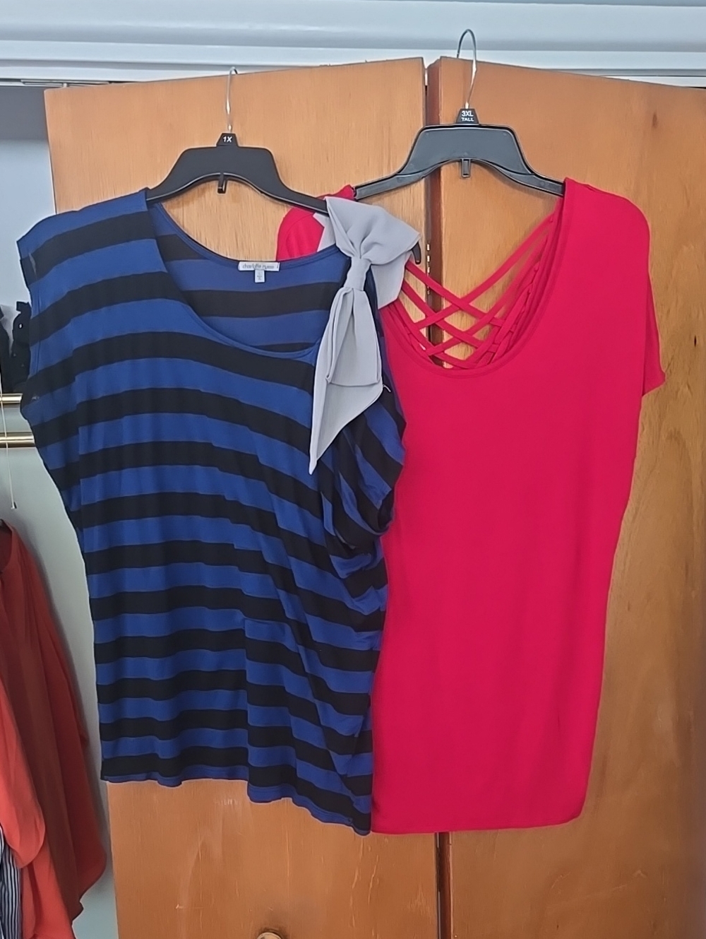 2 Women's Top; 1 Blue & Black With Schoulder Bow & 1 Red With Latice On The Back